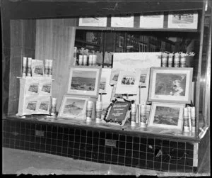 Display of Whites Aviation photographs in the window of Whitcombe and Tombs Ltd