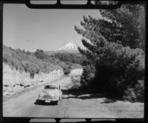 Morris Minor on the Desert Road with Mount Ngauruhoe in the background