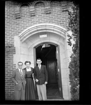 Firth family members standing outside residential home, San Francisco, United States of America