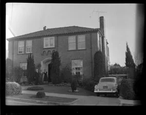 Firth family members standing outside residential home, San Francisco, United States of America