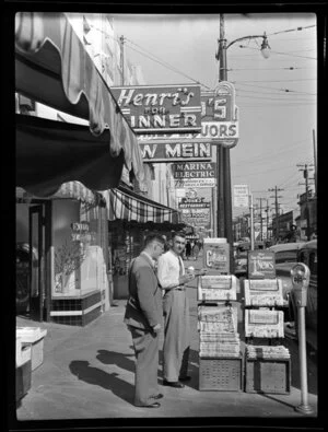 Two men outside a bookstore in San Francisco, United States of America