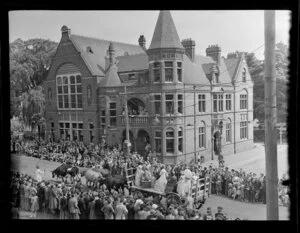 Christchurch Centennial celebrations, cattle and a cartload of people in the parade going along Worcester Street