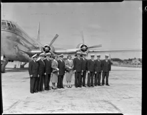 Pan American World Airways, crew members standing in front of Stratocruiser aircraft at Whenuapai Airbase, Auckland