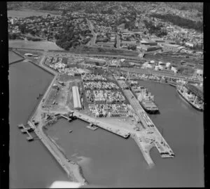 Ships, containers and cranes at Fergusson Wharf, Port of Auckland, Waitemata Harbour, including Main Trunk Line and Parnell