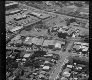Unidentified factories in industrial area, Auckland, including silos and some residential houses