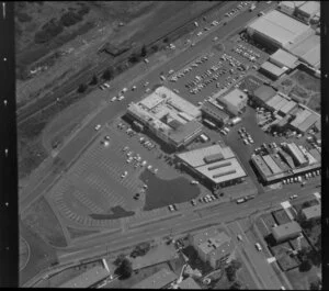 Unidentified factories, car park, and railway line, Glen Innes industrial area, Auckland