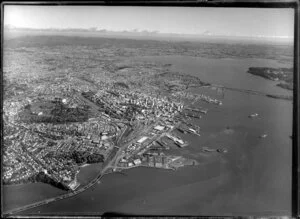 Auckland City and suburbs looking towards Waitakere City, including Waitemata Harbour
