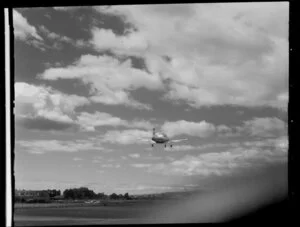 Auckland Aero Club Airtourer aircraft (DNF) taking off from [Ardmore?] aerodrome