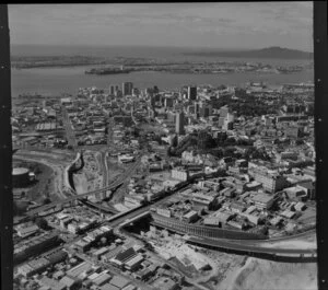 Southern Motorway under construction, Newton, Auckland, including city and Waitemata Harbour