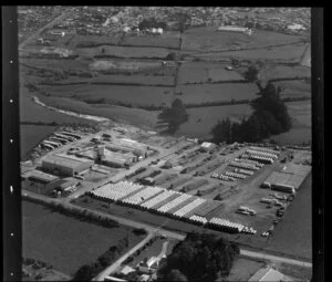 Unidentified factory [concrete pipes?] in Manurewa-Papakura area, Auckland, including farmland