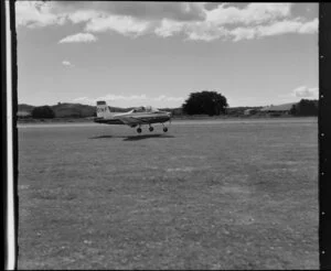 Auckland Aero Club Airtourer aircraft (DNF) landing at [Ardmore?] aerodrome