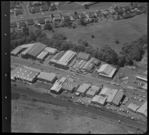 Unidentified factories on Apirana Avenue, Glen Innes, Auckland, including residential housing and railway line