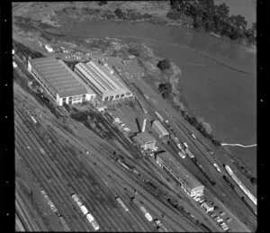 Unidentified factories and Westfield Railway Station, Manukau City, Auckland, including Mangere Inlet