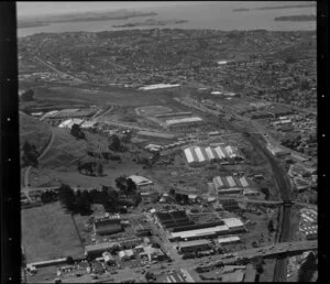 Factories at the base of Mt Wellington, Auckland, looking past Glen Innes and Glendowie to Waitemata Harbour