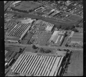 Unidentified factories in Mt Wellington/ Panmure industrial area, Auckland, also including railway station and residential housing
