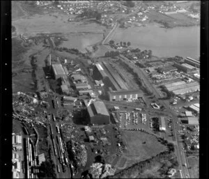Unidentified factories in industrial area, Manukau City, Auckland, including tidal inlet and railway yards