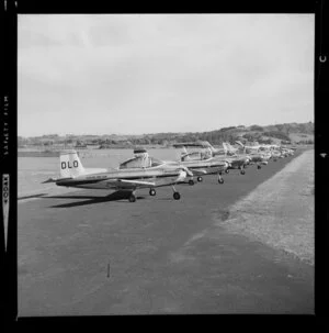 A row of Airtourer aeroplanes on the airstrip at Auckland Aero Club, Mangere