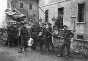 Members of the 19th Armoured Regiment at Faenza, Italy, with a supply of pork and poultry - Photograph taken by K W Lloyd