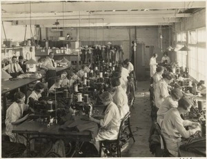 Creator unknown :Photograph of a clothing factory interior with women employees
