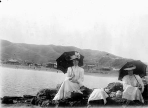 Two women picnicking at Island Bay, Wellington