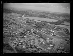 Orakei Basin, Auckland, includes housing, farmland, bridge, beach, shoreline and jetty