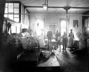 Group, including nurses, with laundry and other equipment, during the 1919 influenza epidemic