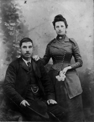 Studio portrait of an unidentified couple