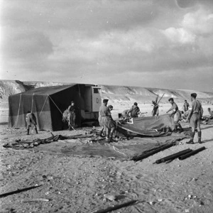 Members of the Mobile Surgical Unit setting up tents, Maadi