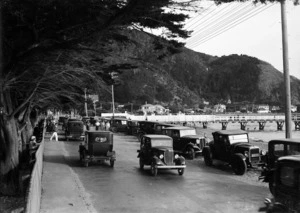 Scene at Days Bay, Eastbourne, showing cars on Eastern Bays Marine Drive