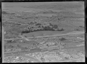 Fletchers work yard, Penrose, Auckland, with Panmure Basin in the background