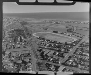 Scenic view of Greymouth coast, including the Dispatch and Foundry Company Limited factory, Monteiths Brewing Company and the Victoria Park combined together with racecourse and rugby field, Grey district, West Coast