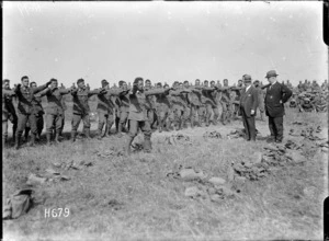 Members of the Pioneer Battalion performing a haka for ministers Massey and Ward, Bois-de-Warnimont, France