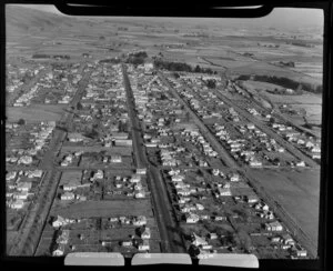 Milton, Otago, showing housing, roads and flat plains in the distance