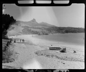 Beach scene including young woman with horse and bathers, Omapere, Northland