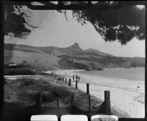 Beach scene including young woman with horse and bathers, Omapere, Northland