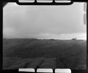 Johnsonville, Wellington, showing hills and TEAL flying boat in flight