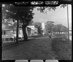 Aggie Grey's Hotel, Apia, Upolu, Samoa, showing people walking along Beach Road