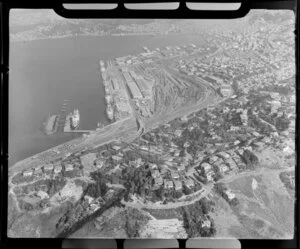 Wellington, with Wadestown in foreground and ships moored at wharves at Aotea Quay