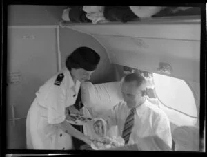 Mr F J H Grattan, Secretary of Samoa Affairs, NZ High Commission, on board aircraft TEAL (Tasman Empire Airways Limited), Satapuala, Upolu, Samoa