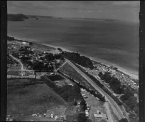 Orewa, Rodney County, Auckland, showing houses and beach