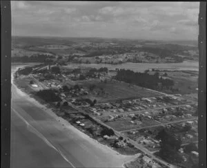 Orewa, Rodney County, Auckland, showing houses, roads and coastline