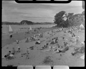 Beach scene at Paihia, Bay of Islands, including bathers and boats