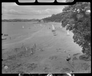 Beach scene at Paihia, Bay of Islands, including bathers and boats