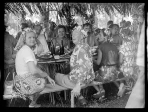Welcoming reception in Tahiti showing Sir Leonard Isitt with guests dining