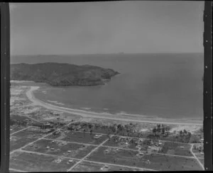 Whangamata, Thames-Coromandel District, showing part of town, beach and Inlet