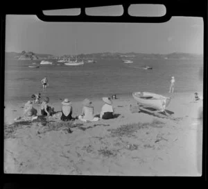 Camping ground, Paihia, Bay of Islands, showing people and boats at the beach