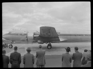 Canadian Pacific Airlines Inaugural DC 6B Service at Whenuapai, showing aircraft leaving airport