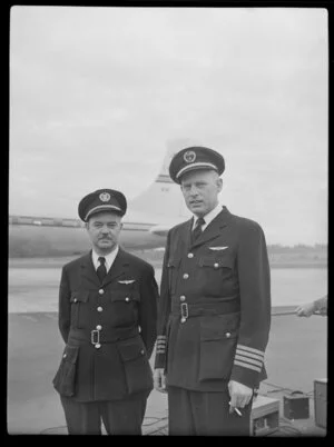 Canadian Pacific Airlines Inaugural DC 6B Service at Whenuapai, showing two unidentified pilots