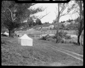 Waikato River outlet, Lake Taupo, showing tent pitched on grass area