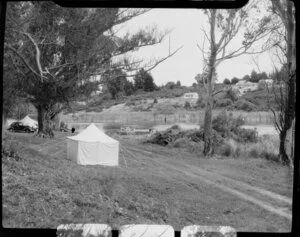 Waikato River outlet, Lake Taupo, showing tent pitched on grass area